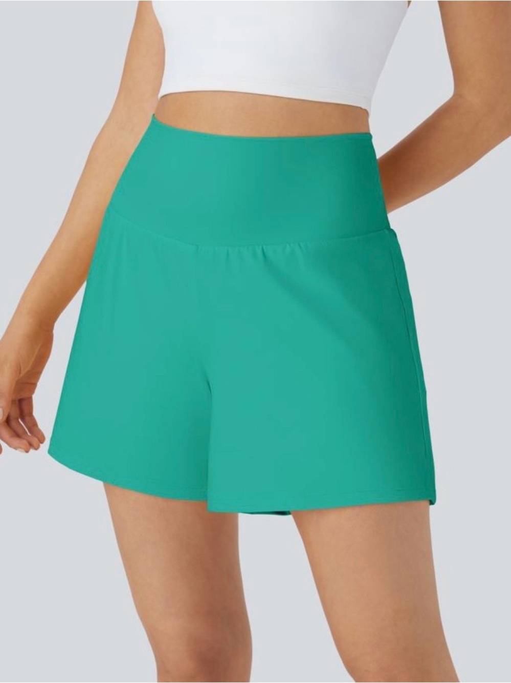 Halara super high waisted yoga shorts 5” Size small Waterfall